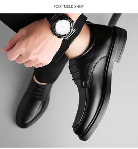 Detailed close-up view of men's black formal leather business shoes with elegant texture