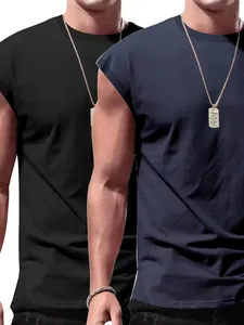 Close-up macro detail of two men's sleeveless tank tops in black and navy blue colors