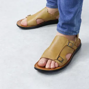 Close-up of comfortable men's breathable tan leather Roman sandals with buckle straps