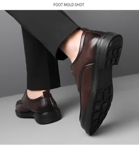 Macro shot of men's brown leather business shoes featuring soft anti-slip rubber sole