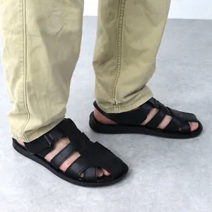 Close-up detail of men's black Roman breathable sandals with soft sole and straps