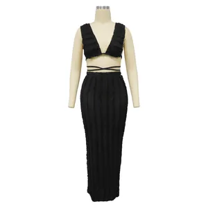Detailed view of black textured omasum lace two-piece skirt set on professional dress form