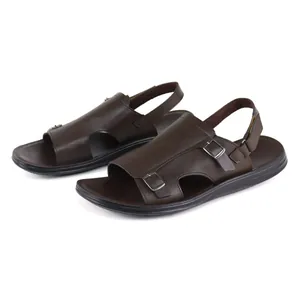 Detailed view showing men's brown Roman sandals with buckle straps and a soft sole design.