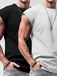 Close-up detail of black and white men's sleeveless tank tops in a soft thin fabric