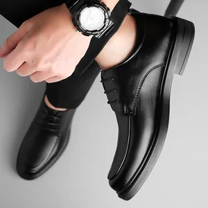 Classic black men's formal leather business shoes with elegant lace-up dress shoe design