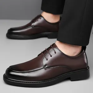 Elegant dark brown leather dress shoes for men, business formal lace-up Oxford style.