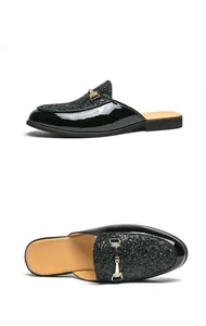 Detailed view of men's black patent leather mule with glitter and metal buckle