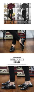 Detailed presentation of men's British style black tassel loafers with pointed toe design.