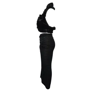Elegante set due pezzi nero con top a balze senza maniche e gonna a pieghe lunga