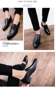 Dettaglio di mocassini in pelle nera con trama a rilievo per uomo, stile casual