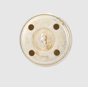 Detailed back view of a premium Japanese brass suit button with Iris engraving