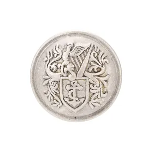 Vintage silver metal heraldic button with embossed anchor and eagle crest for suits