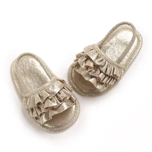 Sparkling gold ruffled baby girl sandals with breathable soft sole and elastic strap