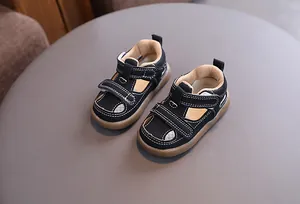 Close-up detail of retro breathable baby closed-toe sandals with velcro straps