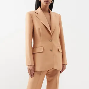 Elegant camel tailored blazer with decorative gold buttons for professional women's wear