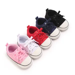 Variety of colorful baby canvas shoes for boys and girls aged 0-1 year old