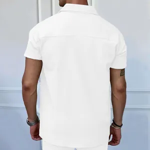 Back view of men's minimalist white short sleeve ribbed polo shirt with textured fabric