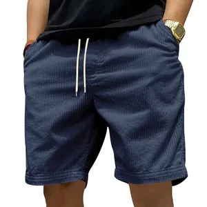 Heren corduroy strandshorts, losse rechte pasvorm in marineblauw met trekkoord.