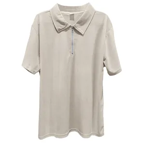 Close-up of men's summer Polo shirt showing fine ribbed texture and zipper detail.