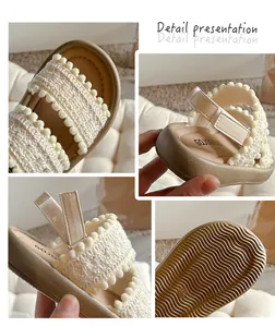 Macro detail of toddler girls' vintage crochet sandals featuring cream pom-poms and wavy sole
