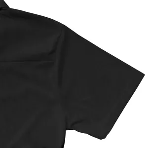 Close-up of textured fabric and sleeve stitching on a black men's zipper polo shirt.