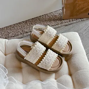 Stylish girls retro lace sandals featuring soft soles and pom-pom trim for summer