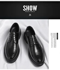 Detailed close-up of breathable black perforated men's formal leather dress shoes