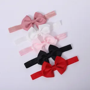 Juego de cinco diademas elásticas para bebé con lazos de grosgrain acanalados en varios tonos