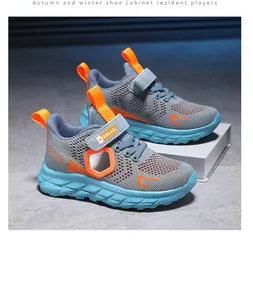 Close-up of lightweight breathable mesh boy's running shoes with blue and orange details