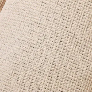 Close-up view of the intricate breathable hollow knit texture on a beige men's sweater.