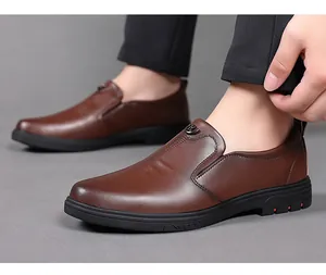Close-up of men's brown leather business casual slip-on shoes with soft flexible sole.