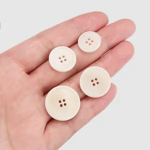 High quality ivory white natural corozo buttons with four-hole design for luxury suits