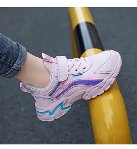 Detail view of pink girls' lightweight casual running sneakers with adjustable velcro closure