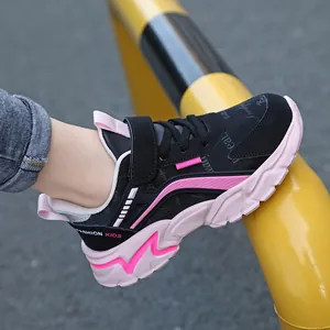 Lightweight pink and black running shoes for girls in a casual outdoor setting