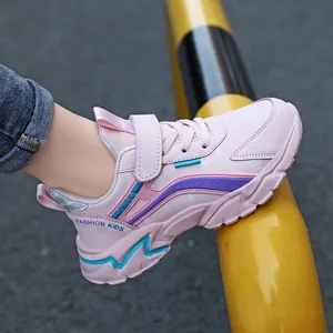 Pink lightweight casual sneakers for girls aged 6-12 featuring velcro straps
