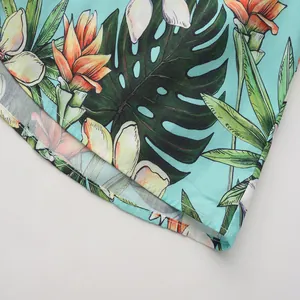 Primer plano de la tela de flores tropicales y el dobladillo de una camisa hawaiana