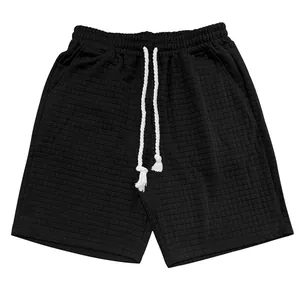 Detailansicht der schwarzen Herren-Freizeit-Sportshorts mit Waffelgitter-Textur