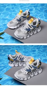 Breathable mesh boys' sneakers with a sporty design and chunky anti-slip sole.