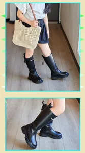Vue détaillée de bottes hautes en cuir noir pour fille avec fermeture éclair au dos