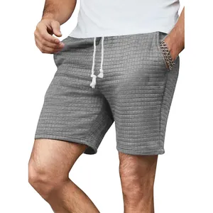 Detailansicht graue Freizeitshorts mit Waffelstruktur und Kordelzug für Herren