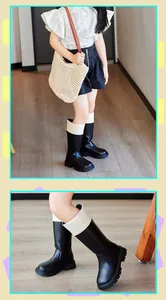 Detail view of children's British style Martin boots with white contrast cuff and back zipper