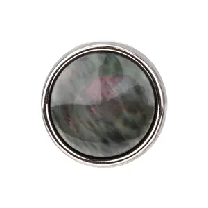 Elegante bottone naturale in madreperla nera con bordo argentato per camicie e polo chic
