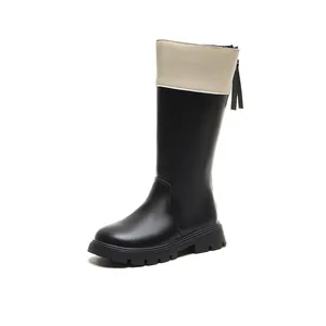 Children's British style tall Martin boots in black and cream with a back zipper detail