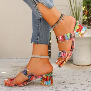 Vibrant colorful block heel sandals featuring gemstone-embellished chunky heels for summer