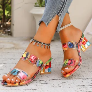 Stylish women's colorful block heel sandals with transparent patterned straps for summer