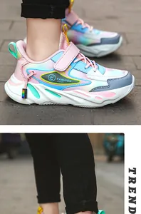 Primo piano di scarpe da ginnastica traspiranti per bambine con design a sfumatura.
