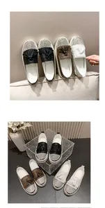 Fashionable women's platform loafers with sparkly rhinestone toes and tassel details