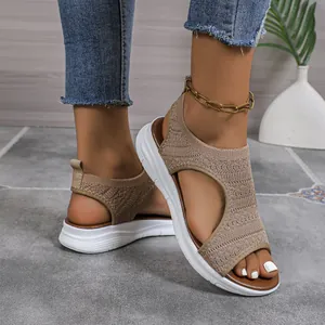 Casual khaki women's mesh sport sandals featuring a thick white sole and open-toe.