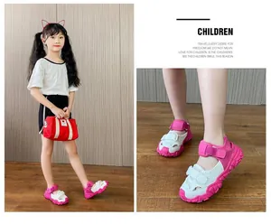 Close-up view of pink and white breathable mesh sports sandals for active children