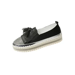 Stylish women's platform loafers with rhinestone tassels and thick white sole